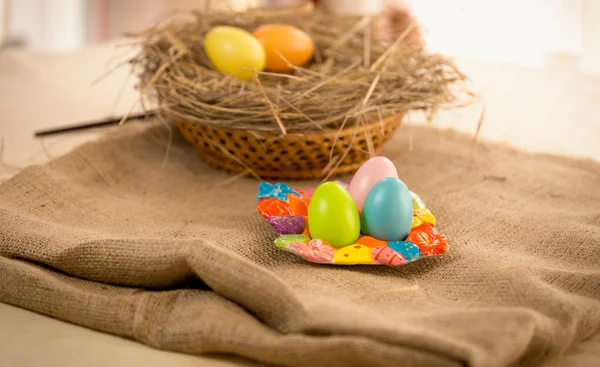 Traditional eggs lying on table at Easter — Stock Photo, Image