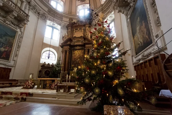 Decorated Christmas tree at big Catholic cathedral at Salzburg Stock Photo
