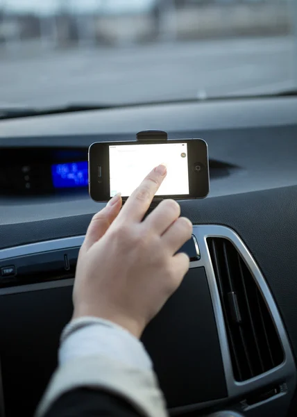 Female driver using navigation system on dashboard — Stock Photo, Image