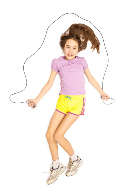 Isoliertes Foto eines lächelnden Mädchens, das mit Springseil springt — Stockfoto