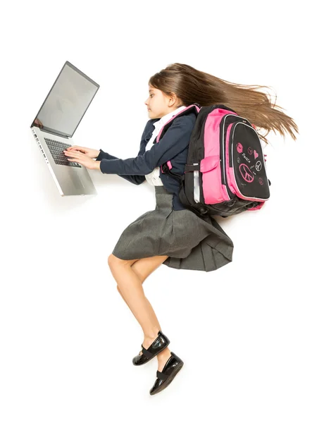 Top vista tiro isolado de estudante com mochila usando laptop — Fotografia de Stock