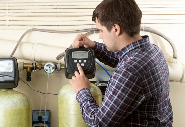 Engineer checking pressure meters at factory — Stock Image Engineer checking pressure meters at factory Royalty Free Stock Images