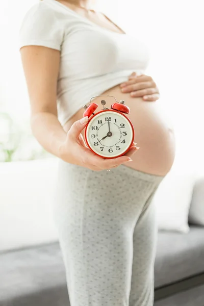 Tiro conceitual de tempo para o bebê nascer — Fotografia de Stock