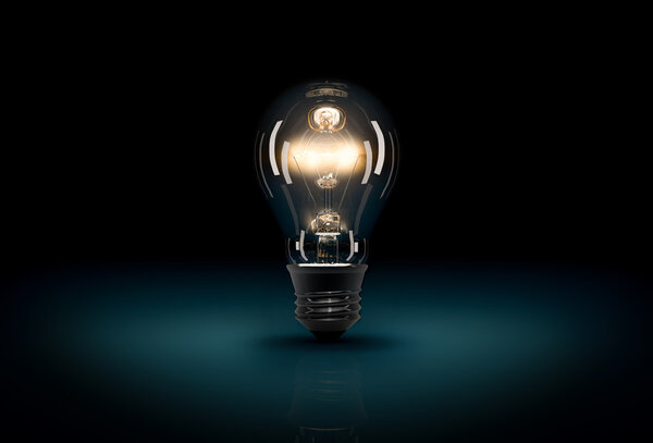 Свечение 3D лампочки на темно-синем фоне
