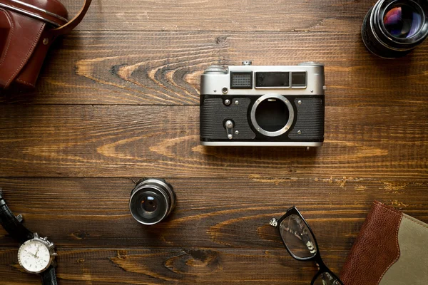 Top view of old analog camera, lenses, notebook and watches — Stock Photo, Image