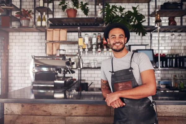 Proud coffee shop owner at counter — Stock Photo, Image