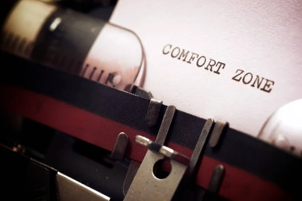 Comfort zone phrase written with a typewriter.