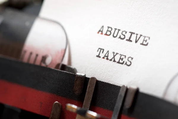 Expression Taxes Abusives Écrite Avec Une Machine Écrire — Photo