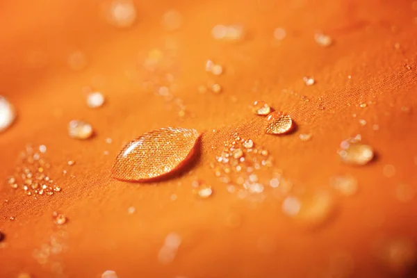 Close-up of the fabric of a waterproof mountain jacket.