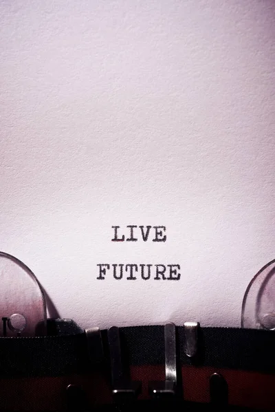 Live future phrase written with a typewriter.