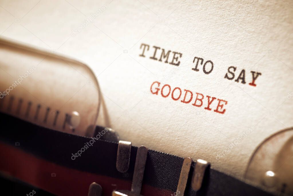 Time to say goodbye phrase written with a typewriter.