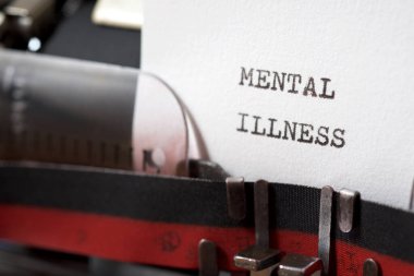 Bir daktiloyla yazılmış akıl hastalığı ifadesi.