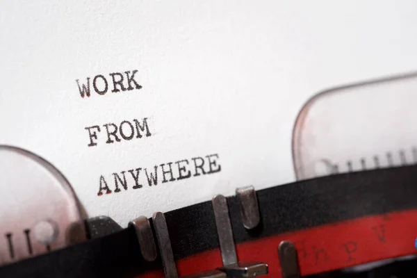 Work from anywhere phrase written with a typewriter.