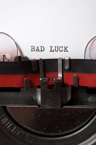 Bad luck phrase written with a typewriter.