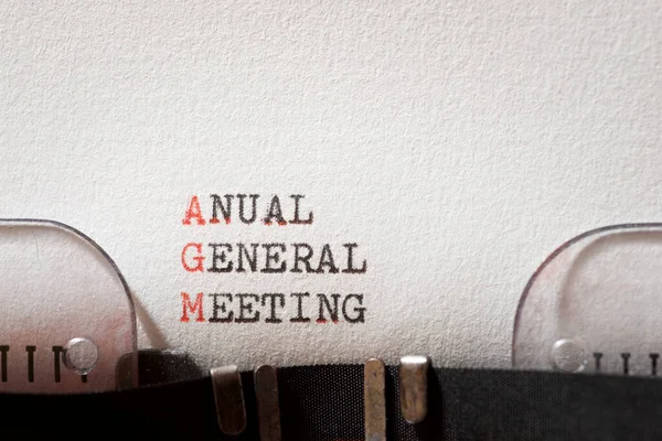 Anual general meeting phrase written with a typewriter.