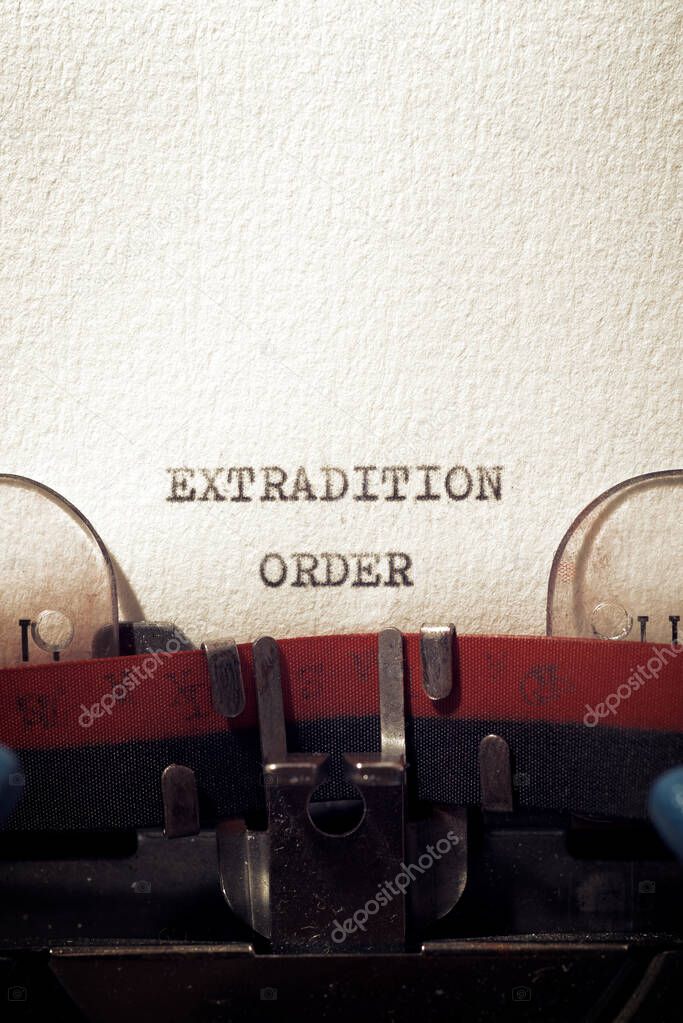 Extradition order phrase written with a typewriter.