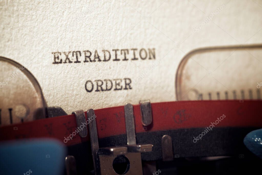 Extradition order phrase written with a typewriter.