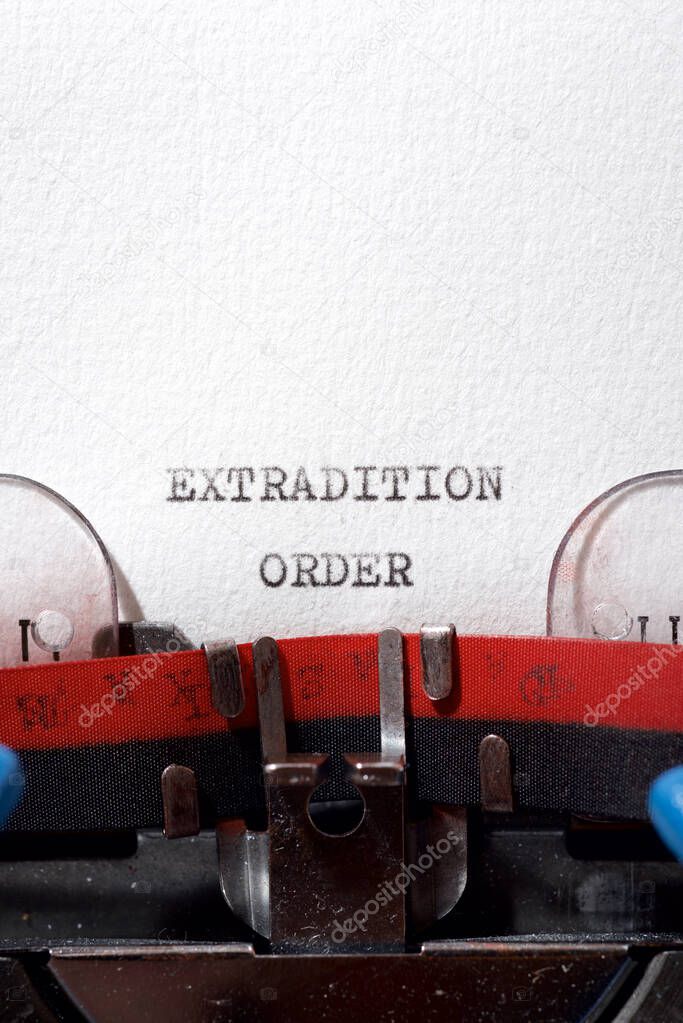 Extradition order phrase written with a typewriter.