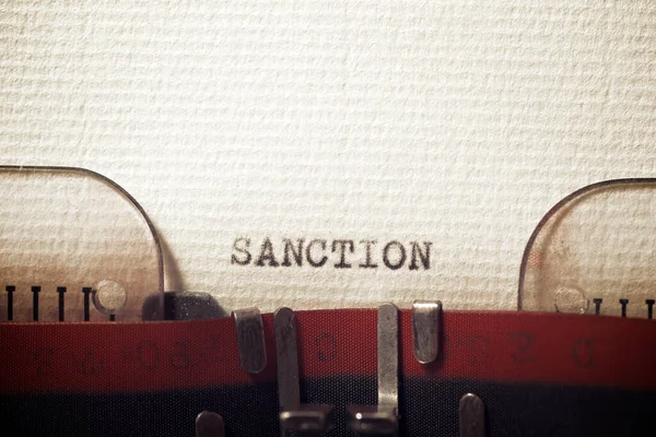 Słowo Sankcja Napisane Maszyną Pisania — Zdjęcie stockowe