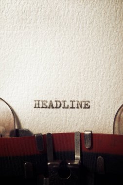 The word headline written with a typewriter.
