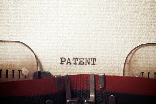 Palabra Patente Escrita Con Una Máquina Escribir — Foto de Stock