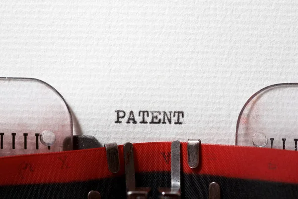 Palabra Patente Escrita Con Una Máquina Escribir — Foto de Stock