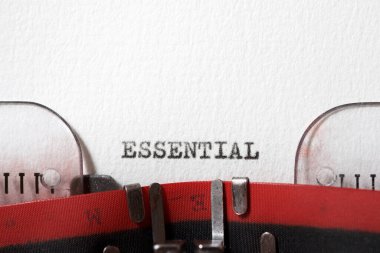 The word essential written with a typewriter.