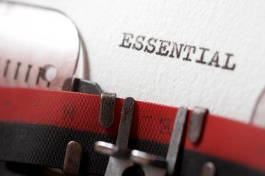The word essential written with a typewriter.