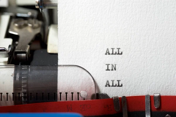 All in all phrase written with a typewriter.