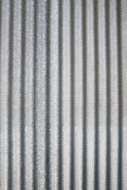 Arka plan modern bir cephenin metal yüzeyi ile oluşturuldu.