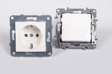 Stüdyo ışıkları. Soket ve anahtar beyaz arkaplanda, yakın plan