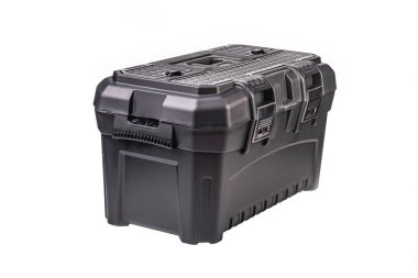 Stüdyo ışıkları. Koyu plastik alet kutusu. Beyaz bir arka planda. Yakın plan.,