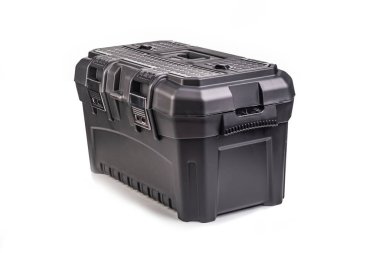 Stüdyo ışıkları. Koyu plastik alet kutusu. Beyaz bir arka planda. Yakın plan.,