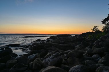 İsveç 'te Vattern Gölü üzerinde gün batımı