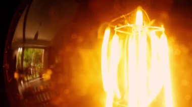 Light Bulb Turning On. Close Up.  