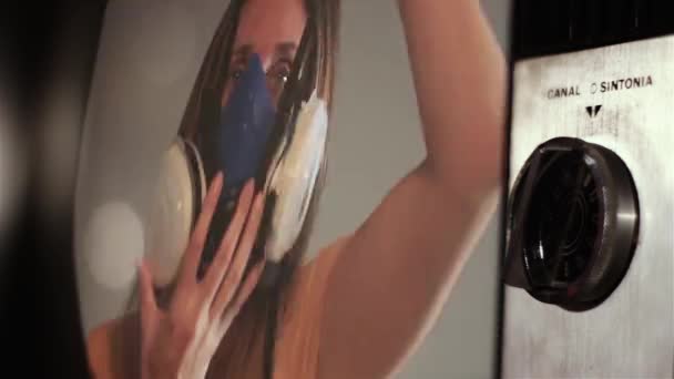 Woman Putting Respirator Mask Seen Retro Set — Video
