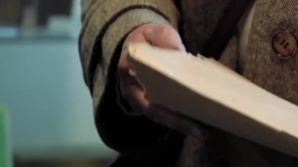 Male Hands Holding Vinyl Record Paper Case Close — Vídeo de Stock