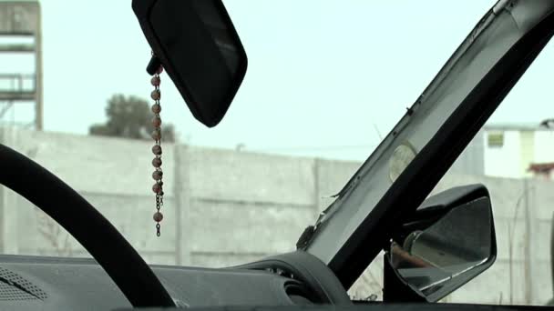 Interior Old Wrecked Car Rosary Hanging Rear Mirror Close — Stock Video