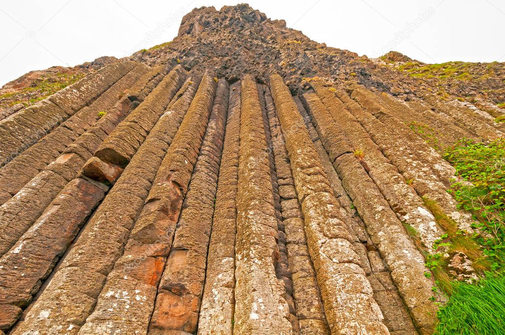 Dramatic Postpile Wall Looming Above at the Organ on the Giants Causway in Northern Ireland
