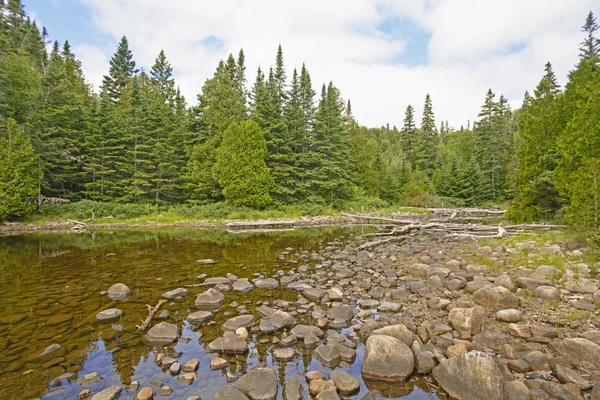 Rocks and Water on the Shallows of a Secluded Lake — Stock Photo, Image