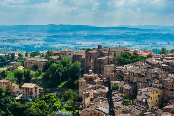 Siena. Image of ancient Italy city, view from the top. Beautiful house and chapel. — Stock Photo, Image