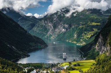 Cruise ship in Geiranger fjord, Norway clipart