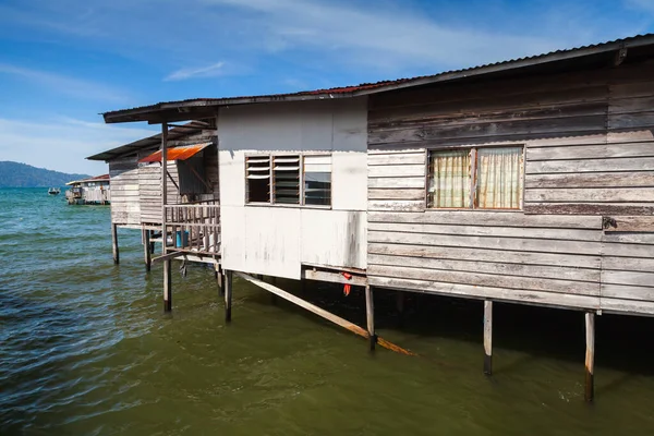 Wooden houses and barns on stilts. Sabah, Kota Kinabalu, Malaysia — Stock Image Wooden Houses Barns Stilts Sabah Kota Kinabalu Malaysia Royalty Free Stock Images