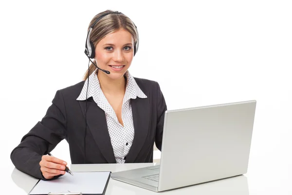 Operador de telefone com fones de ouvido e laptop — Fotografia de Stock