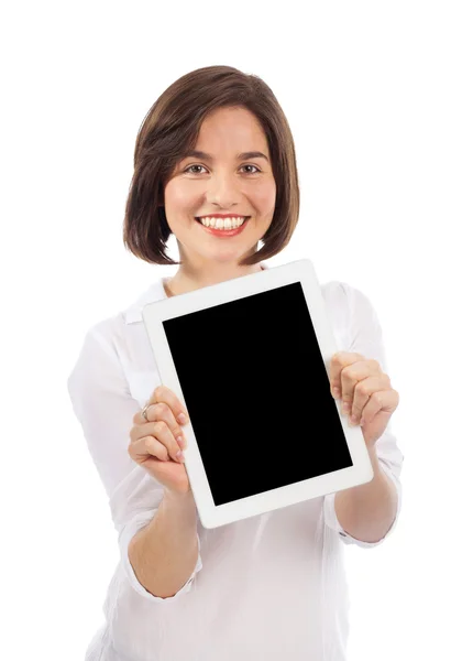 Brunetka ukazující digitální tablet — Stock fotografie