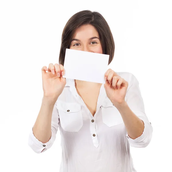 Beautiful young woman showing a blank business card — Stock Photo, Image