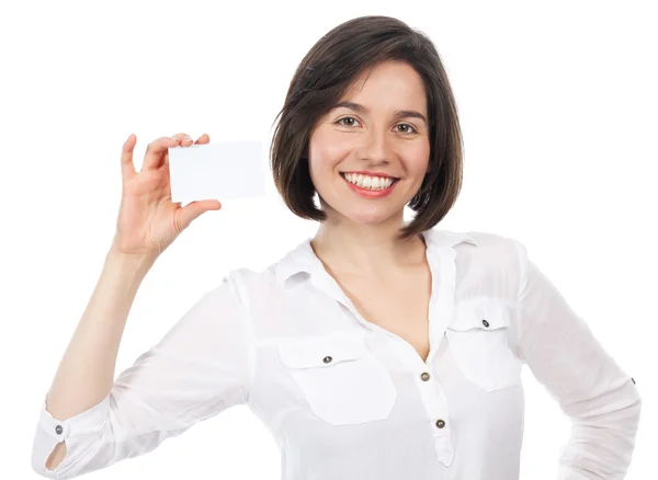 Femme souriante montrant une carte de visite blanche — Photo