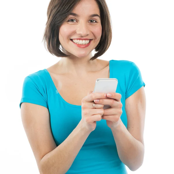 Young woman texting on her phone Stock Image