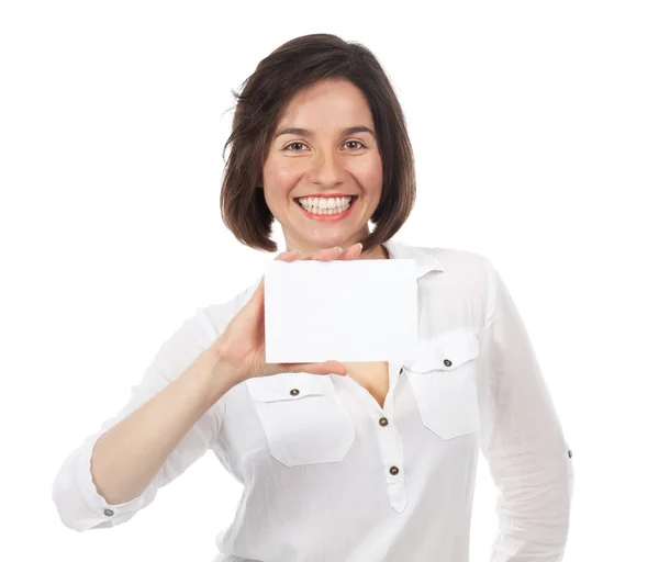 Mujer feliz mostrando un letrero en blanco — Foto de Stock