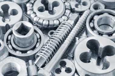 pek çok fındıklı metal vidaların arka planı.